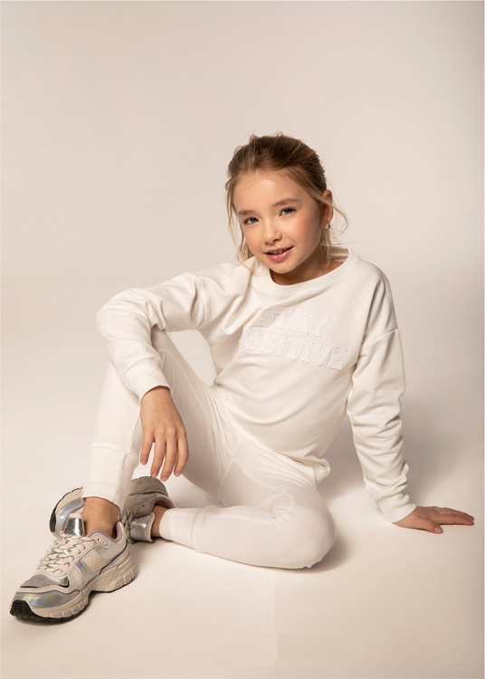 Cremefarbener Mädchen-Trainingsanzug